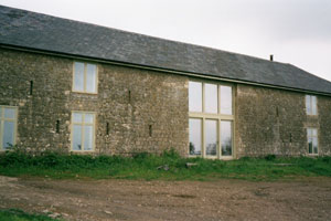 Custom glazing in converted farm buildings